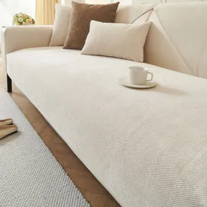 Close-up of beige chenille sofa cover with thick twill texture and waterproof fabric