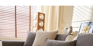 Close-up of waterproof chenille sofa cover showing thick textured fabric in dark grey