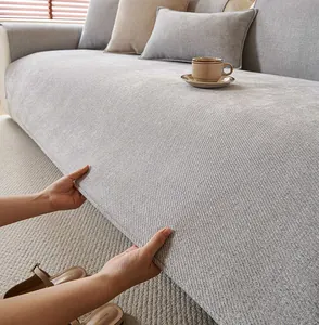 Detailed view of light gray chenille sofa cover fabric texture and thickness