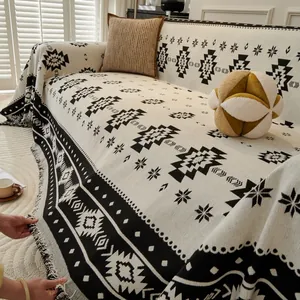 Bohemian black and white geometric sofa cover with thick knit fabric and fringe edges