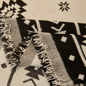 Bohemian thick woven sofa cover throw with monochrome geometric patterns and tassel fringe