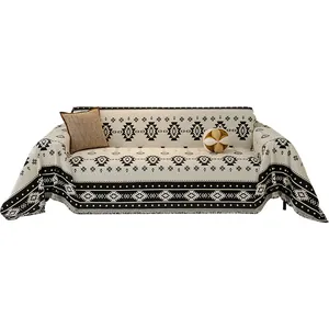 Bohemian thick woven sofa cover throw with tribal geometric patterns and fringe detail