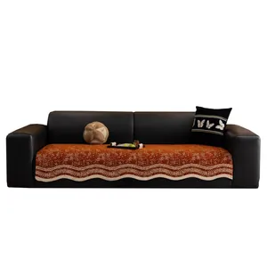 Chenille Sofa-Schutzmatte in Orange mit Wellenrand und rutschfester Textur auf Leder