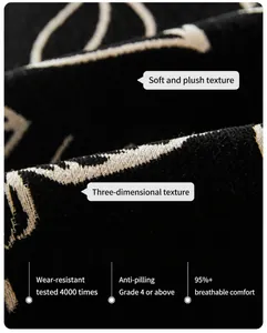 Dettaglio macro del tessuto resistente in ciniglia nera con trama a fiori bianchi