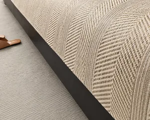 Detail of off-white sofa cover with a textured herringbone weave pattern