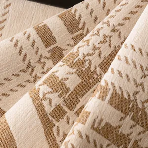 Thick chenille sofa cover with reindeer pattern and geometric textures in beige and brown