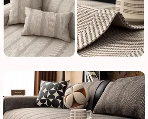 Detailed view of herringbone weave beige sofa cover fabric with durable non-slip texture