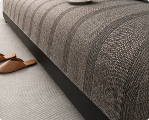 Detail of dark grey sofa cover with premium herringbone and textured weave patterns