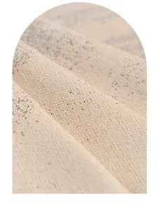 Primer plano de la textura jaspeada en funda de sofá de chenilla suave tejida