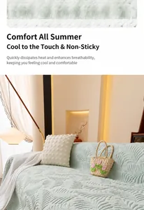 Detail of mint green ice silk sofa mat with cooling leaf texture and breathable mesh