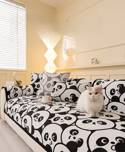 Close-up of soft chenille sofa cover featuring cute black and white panda pattern