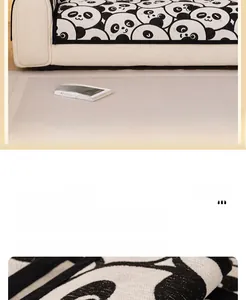 Close-up of thick chenille sofa cushion featuring a black and white panda print texture