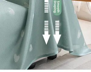 Close-up of mint green heart-patterned mesh sofa cover fabric showing smooth drape