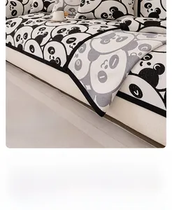 Detail of faux fur rabbit plush sofa cover with cute panda print and soft texture