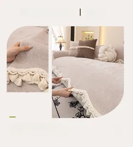 Close-up of beige chenille sofa cover fabric with elegant wavy tassel fringe detail