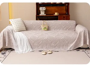 Close-up of embossed feather texture on mauve cooling ice silk sofa cover for living room