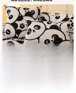Detail showing soft faux rabbit fur texture and cute panda pattern on the plush cushion