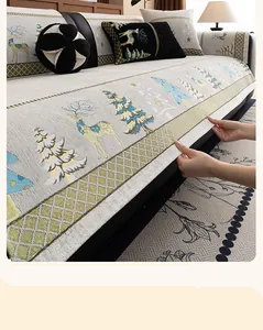 Close-up of thick chenille sofa cushion with elk and pine tree jacquard weaving