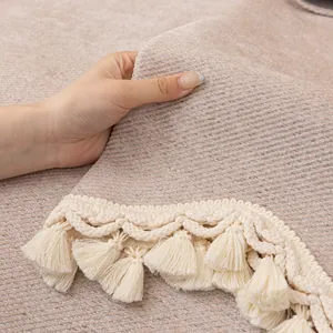 Modern minimalist solid color chenille sofa cover with tassels and ribbed texture