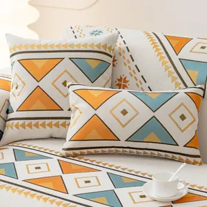 Housse de canapé bohème en chenille avec motifs géométriques et coussins assortis
