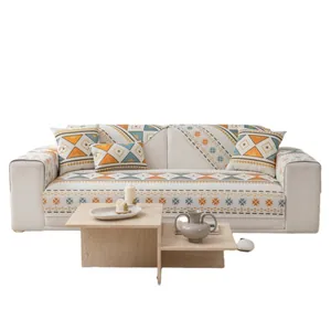 Housse de canapé en chenille bohème aux motifs géométriques avec coussins assortis