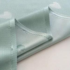 Light green cooling sofa cover blanket with white heart pattern and breathable mesh texture