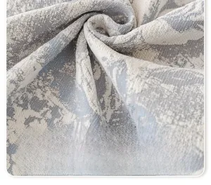 Dettaglio macro del tessuto jacquard ad alta densità con trama morbida e pregiata