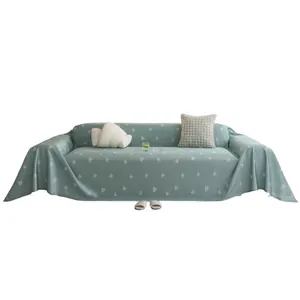 Breathable mint green full-cover sofa slipcover with white heart pattern and waffle texture