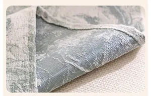 Detailaufnahme des hellgrünen Jacquard-Sofabezugs mit feiner Naht und Textur-Muster