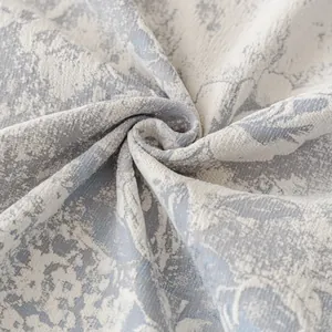 Copridivano jacquard blu e bianco con elegante bordo a balze e morbida trama intrecciata