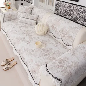 Housse de canapé en chenille de luxe avec motifs floraux et élégantes franges blanches