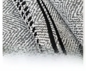 Detail of chenille sofa cover showing black and white chevron weave texture and fabric