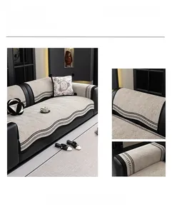 Detailed view of khaki chenille sofa cover with woven geometric edges and fabric texture