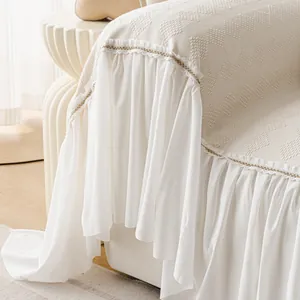 Cream chenille sofa cover with diamond knit texture and elegant ruffled lace trim