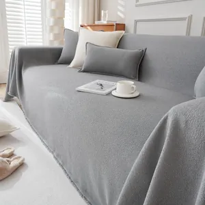 Modern grey teddy fleece sofa cover with fringes and matching throw pillows