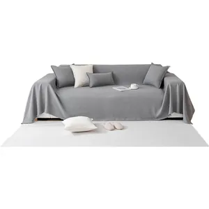 Minimalist grey teddy velvet waterproof sofa cover with decorative fringe and matching pillows