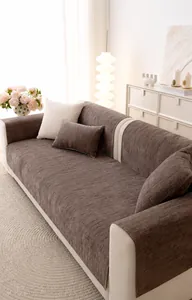 Close-up of brown chenille sofa cover set with textured stripes and matching cushions