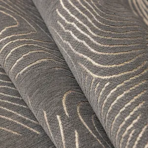 Luxurious dark grey chenille sofa cover with golden wavy texture and woven pattern
