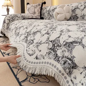 French luxury floral sofa throw cover with elegant fringes and modern cream black patterns
