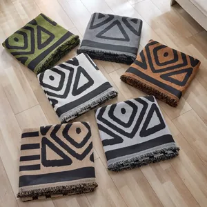 Gray Bohemian knit sofa cover blanket with geometric patterns and fringe tassels