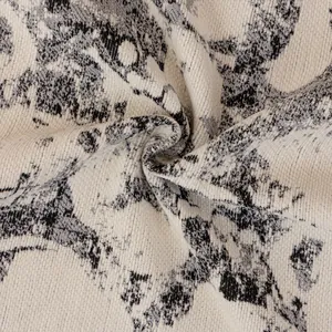 French luxury throw blanket with tassel fringe and abstract floral marble pattern