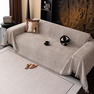 Housse de canapé en maille aspect lin beige-brun avec franges décoratives élégantes