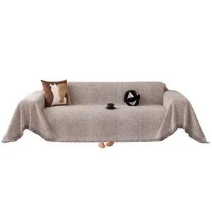 Housse de canapé en mélange coton et lin avec franges et texture tissée de couleur beige