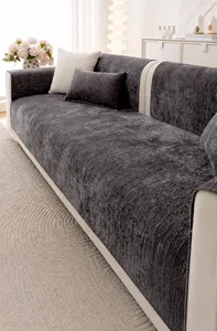 Detail of dark grey chenille sofa cover showing non-slip backing and textured fabric