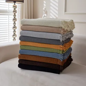 Soft waffle chenille sofa throw blanket with decorative fringe in various colors
