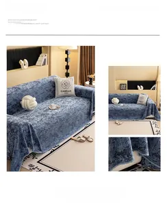 Detail of blue chenille sofa cover with embossed jacquard texture and marble-like pattern