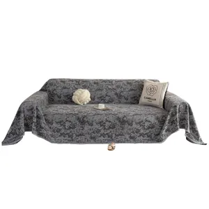 Gray embossed jacquard chenille sofa cover with floral texture and elegant draped edges