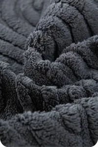 Macro shot of high-density soft plush fabric texture for anti-slip cream style sofa covers
