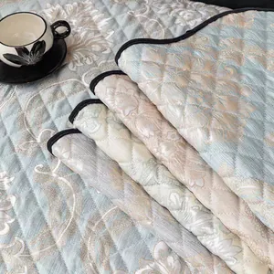 Nordic jacquard non-slip sofa cover with damascus pattern and quilted texture detail