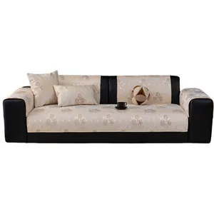 European jacquard sofa cover set with floral patterns and non-slip backing on black sofa